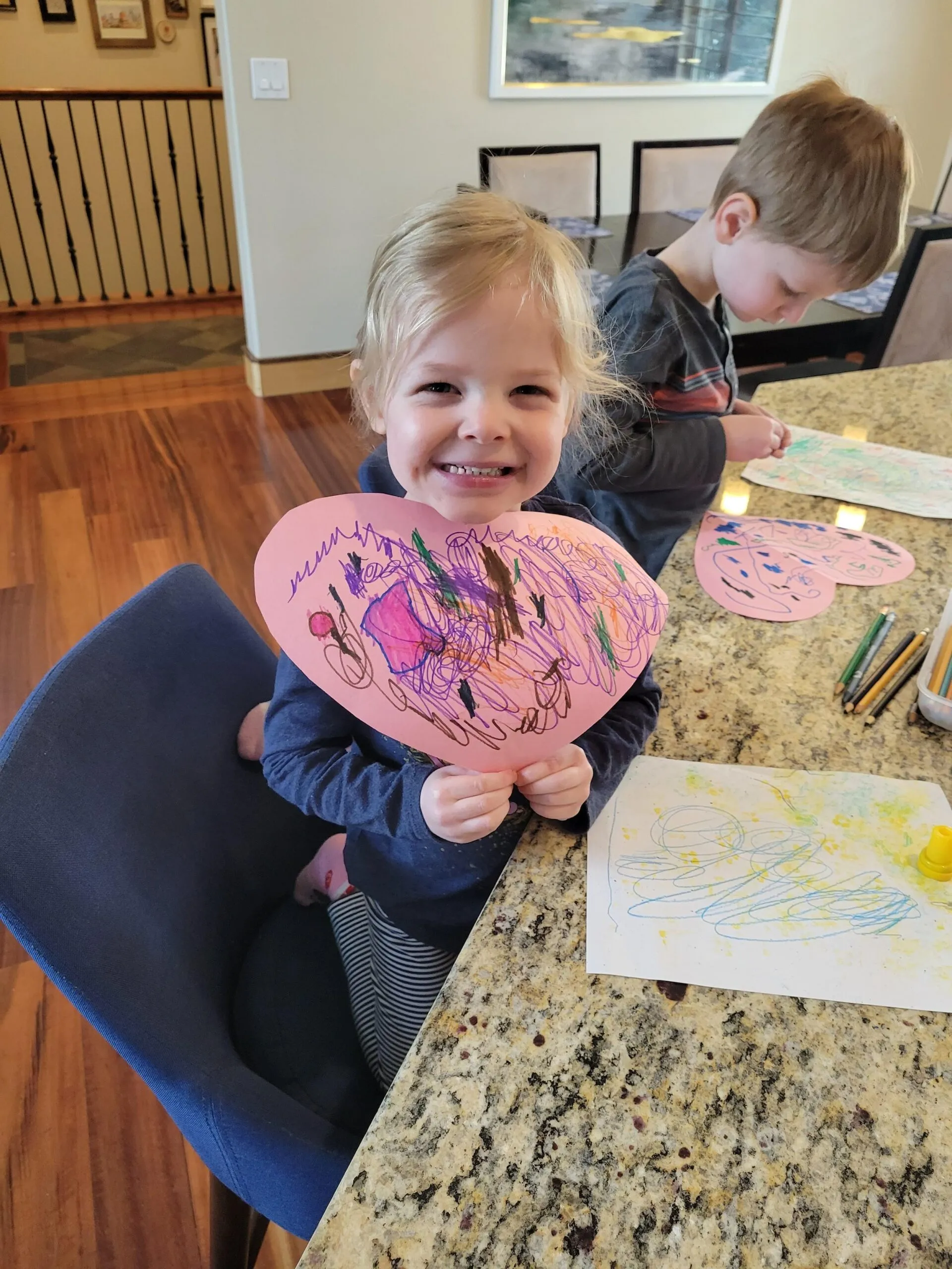Winnie coloring with George